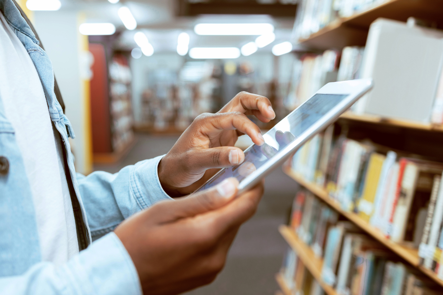 Image of hand with a tablet device