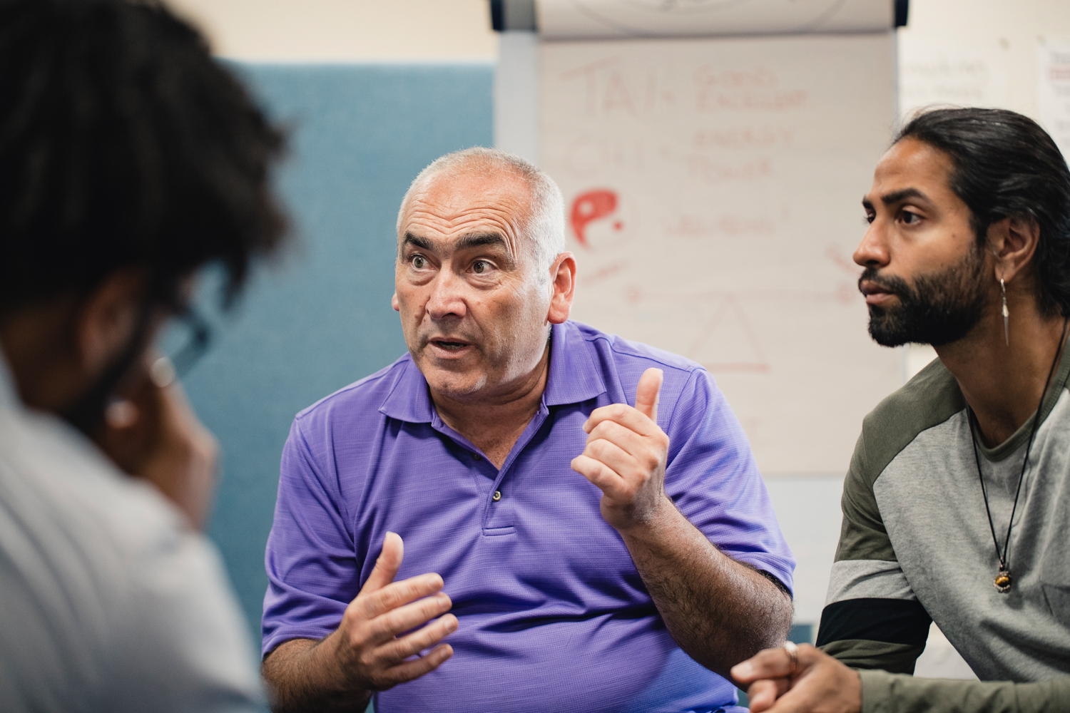 Man talking in group